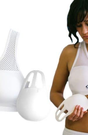 woman modeling a a white chest protector with bra and protective cups